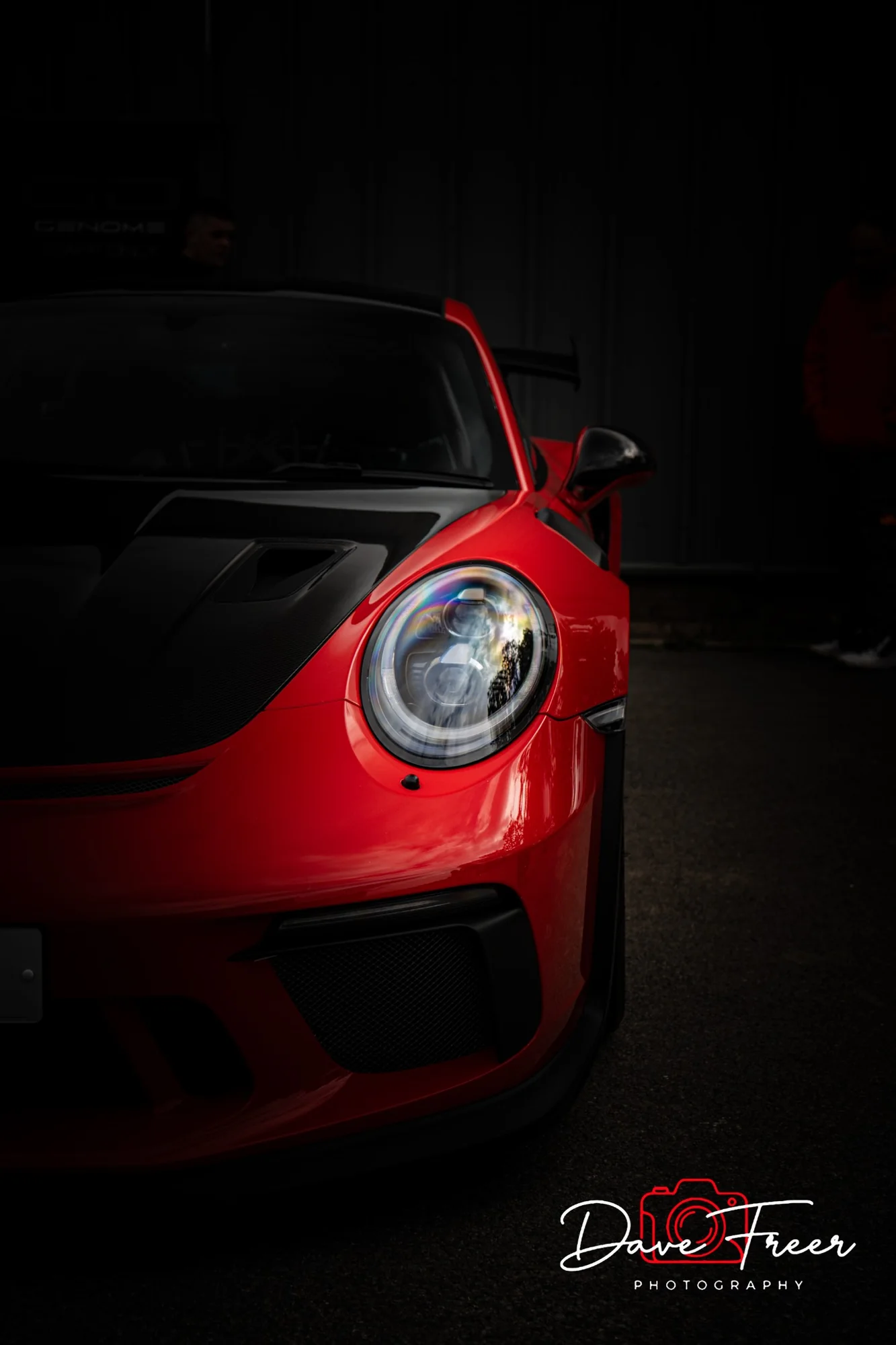 Dramatic red sports car automotive detail photography